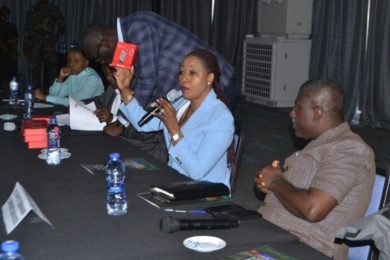IPAC-Mrs-Jean-Mensa-second-from-right-displaying-the-hard-drive-to-be-given-to-all-political-parties-Photo-Victor-A.-Buxton-780×470